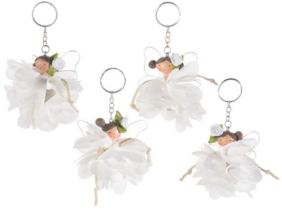 Porte-clés avec robe fée en résine et fleur blanche