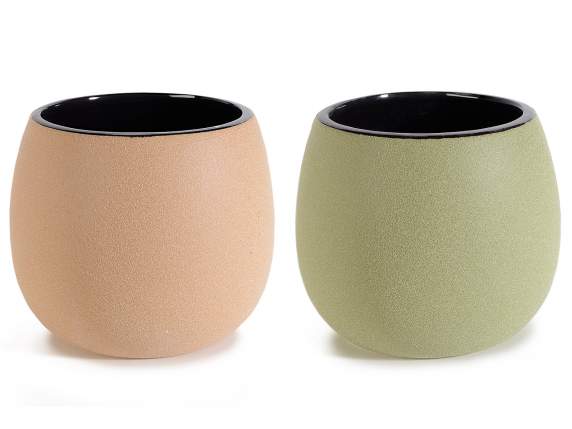 Raw colored porcelain vase with black interior