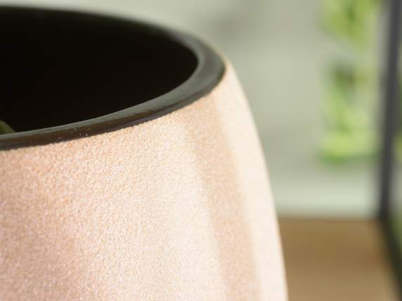 Raw colored porcelain vase with black interior