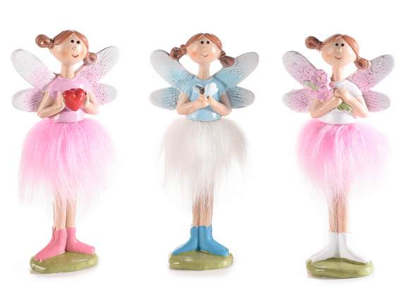 Resin fairy with soft fur dress to lay on