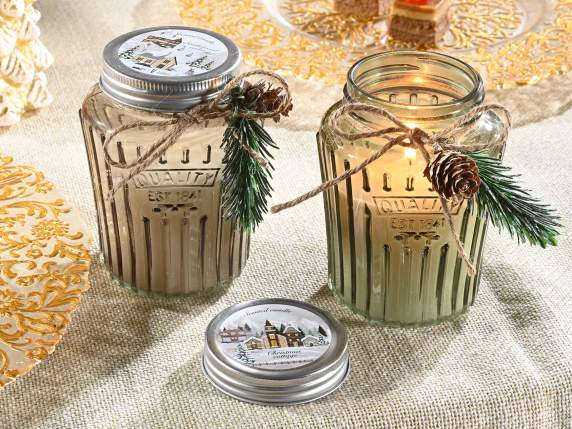 Scented candle in glass jar with bow, pine and pine cone