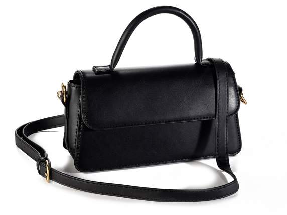 Shoulder bag and handbag in black imitation leather