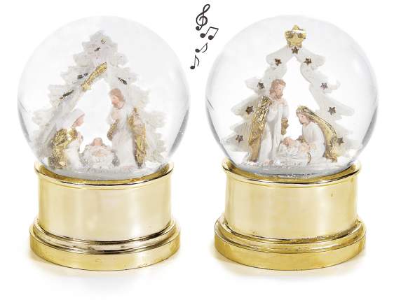 Snow globe music box with shiny golden base Nativity scene