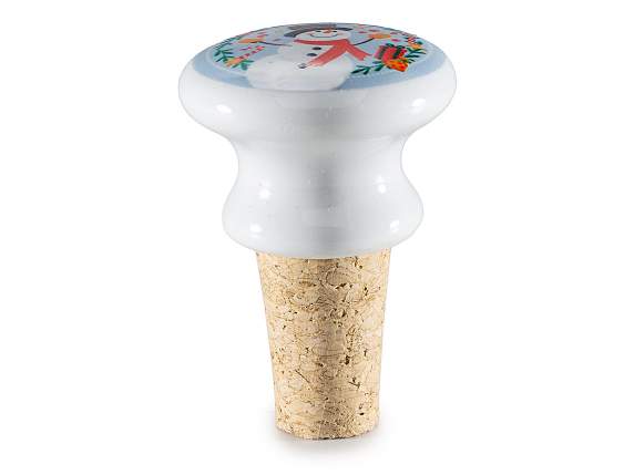 Tapón de corcho y cerámica con adornos navideños.