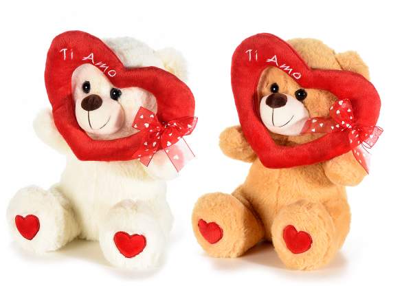 Teddy bear with stuffed heart and organza bow