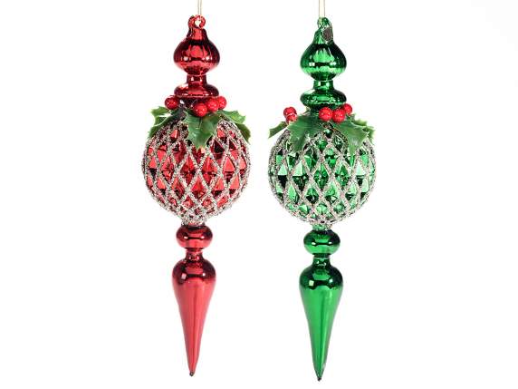 Christmas glass decoration with berries and holly leaves