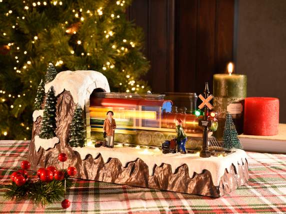 Tren navideño con movimiento, luces y música.