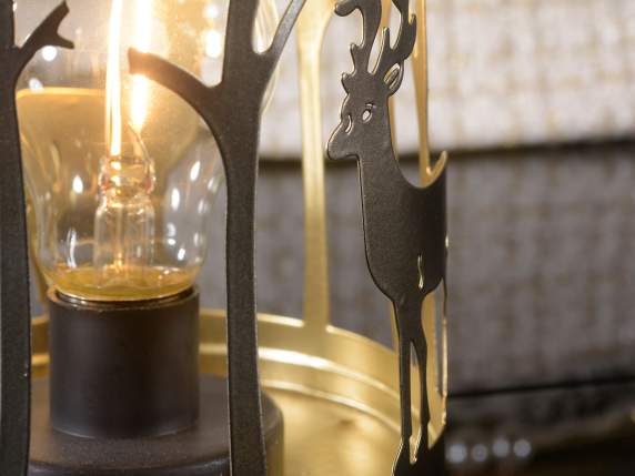 Lámpara de metal con paisaje y renos e interior dorado