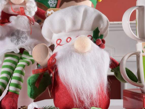 Papá Noel y Mamá Navidad cocina piernas largas en tela de co