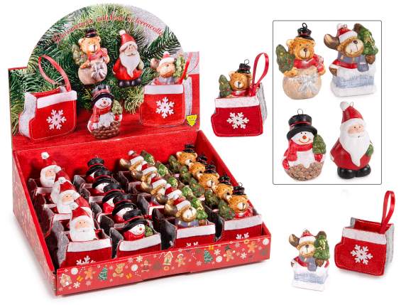 Personnage de Noël en terre cuite dans une chaussette en tis