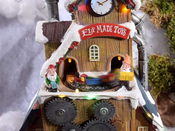 Usine de jouets avec train en mouvement, lumières et musique