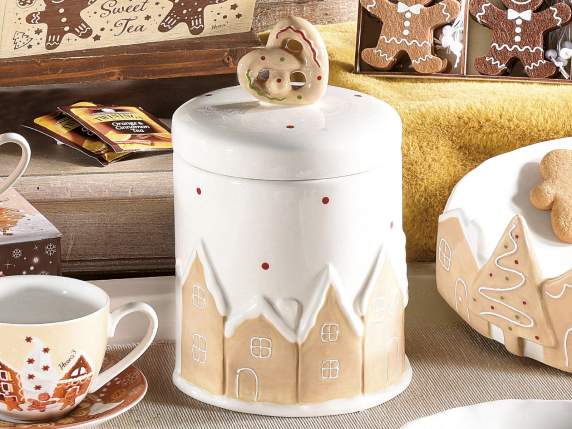 Ceramic food jar with relief landscape and biscuit