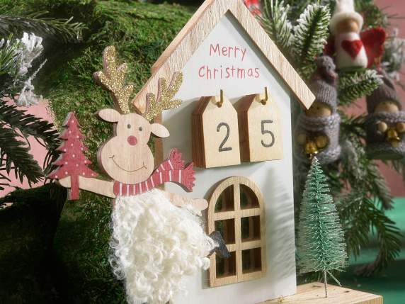 Wooden calendar with Christmas character to place