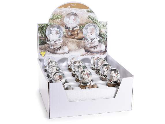 Christmas snow globe on resin boot