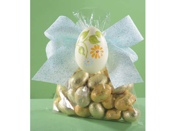 Display of 12 hand-painted plastic eggs to hang
