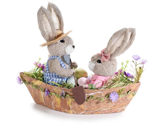 Couple of bunnies in fiber on a rowboat