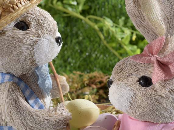 Couple of bunnies in fiber on a rowboat