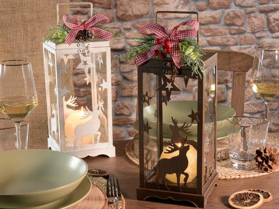 Metal lantern with stars, reindeer and bouquet with bow