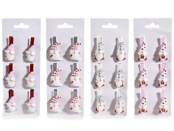 Blister with 6 wooden clothes pegs with pink gnomes