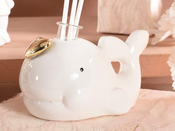 Porcelain whale with golden heart and scented stick