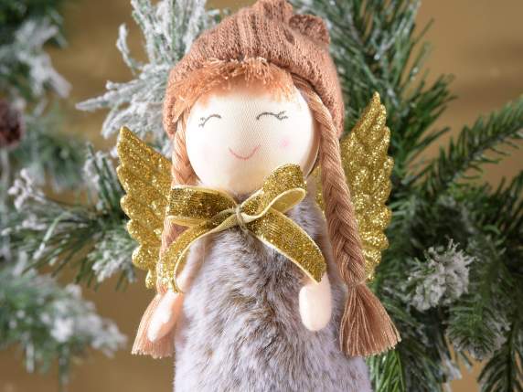 Soft eco-fur angel to be placed with wings and golden bows