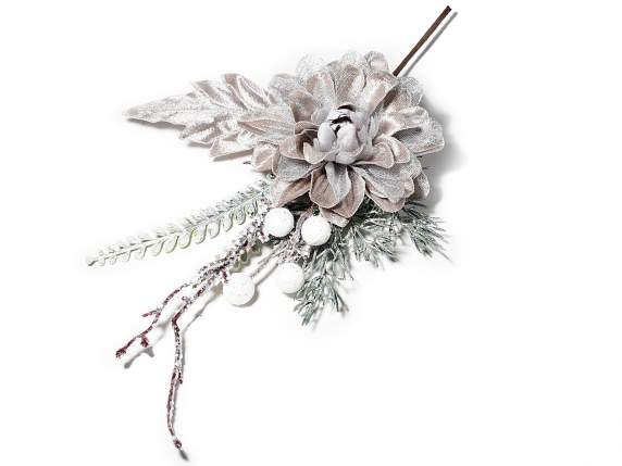 Branch with artificial dove gray anemone with white snow-cov