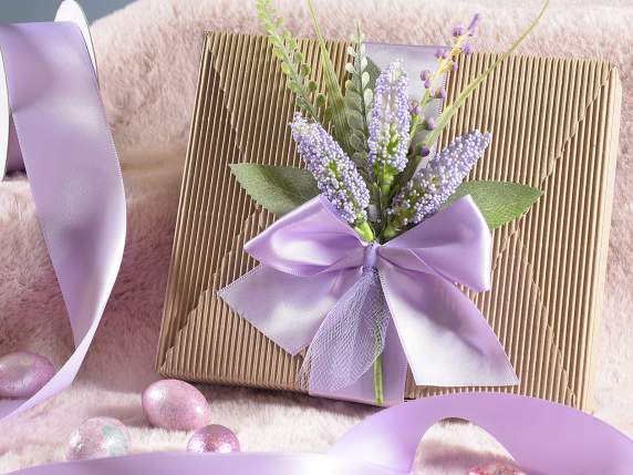 Bouquet with small flowers and artificial leaves