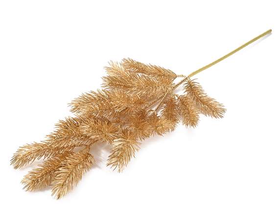Gold-colored artificial fir branch with glitter