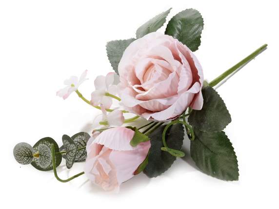 Sprig of rose in pink fabric with bud and small flowers