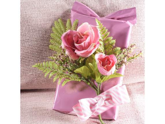 Sprig of artificial rose with bud and small flowers