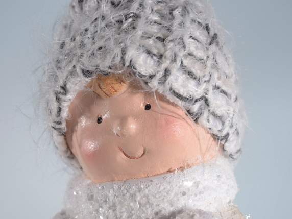 Ceramic boy-girl on snowball with LED light and hat