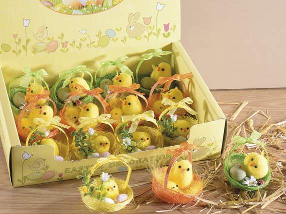 Dispaly with 12 chick in colorful baskets  and eggs