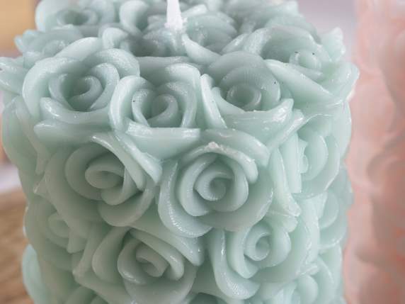 Colourful candle with embossed rose surface