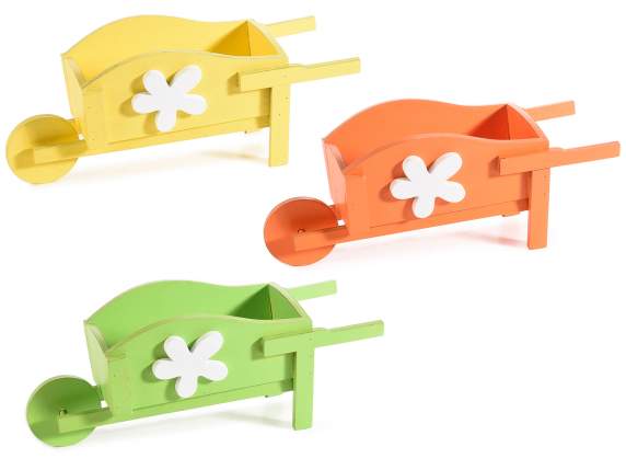 Colorful wooden decorative wheelbarrow with flower