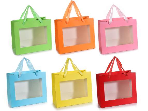 Large colored paper bag with fabric handles and window