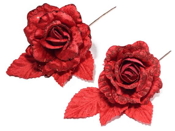 Red artificial rose made of fabric with glitter