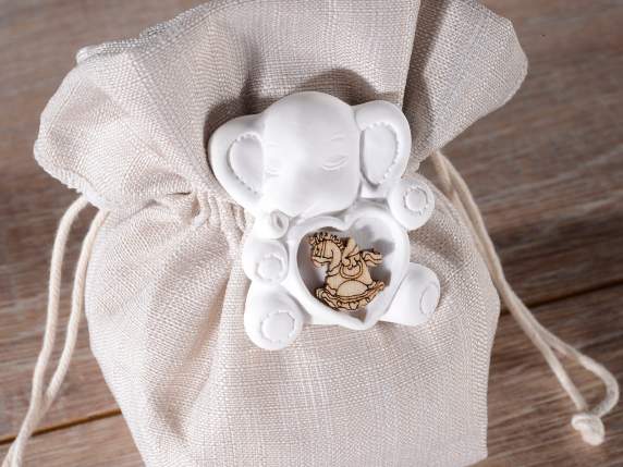 Cotton bag with plaster elephant and tie rod