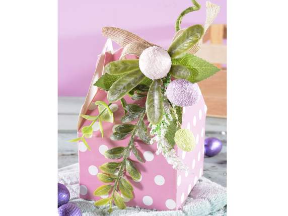Bouquet of colored eggs with leaves, flowers and ribbon