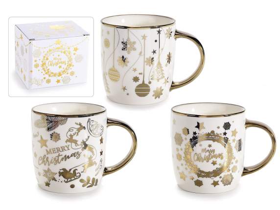 Porcelain cup with gold-like Christmas decorations in gift b