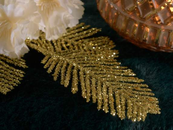 Branch of gold glitter artificial leaves