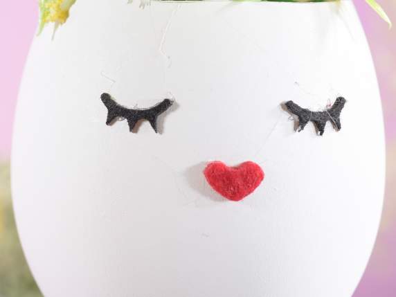 Egg jar with eyes, nose and little flowers to hang
