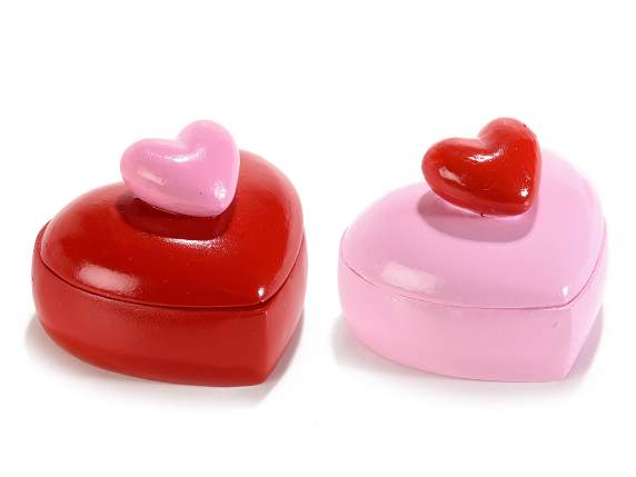 Heart container in colored resin with embossed heart