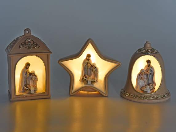 Resin nativity scene with golden details and led light