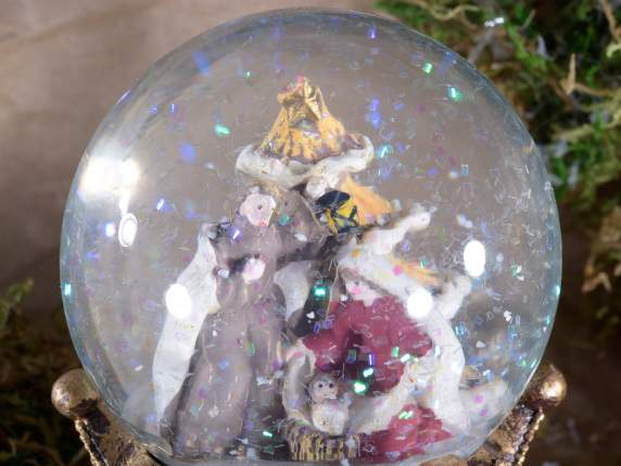 Snow globe with resin Nativity scene on crown base