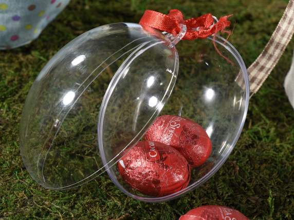 Transparent egg that can be opened with a ribbon to hang