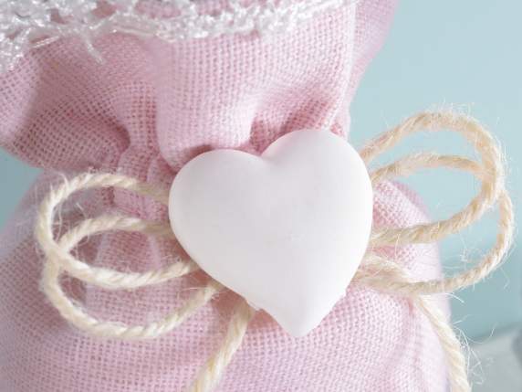 Pink fabric bag with lace, plaster heart and tie