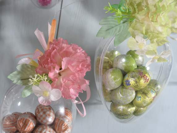 Clear plastic egg openable with hanging ribbon