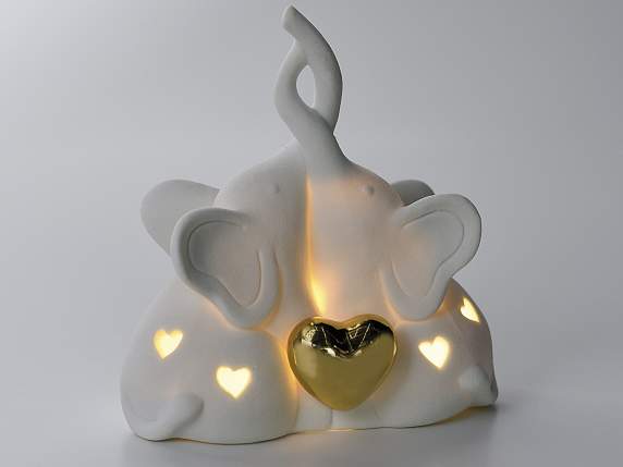 Pair of porcelain elephants w - led light and golden heart