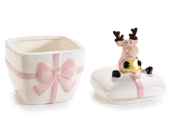 Colorful ceramic jar with bow and reindeer with star