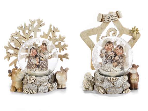 Snow globe with nativity scene and resin decorated base